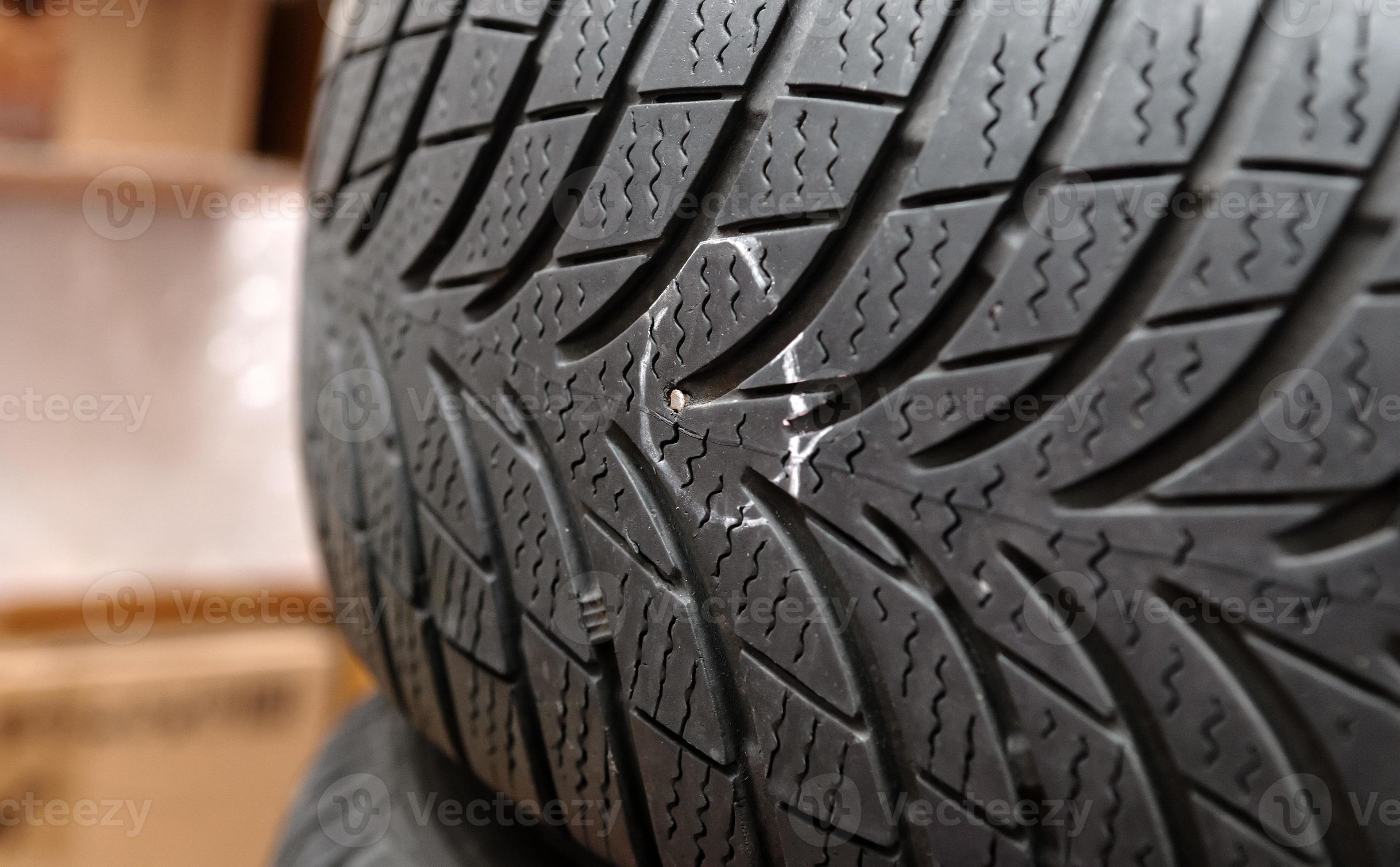 nail in tyre 1407831 Stock Photo at Vecteezy nail in tyre 1407831 Stock Photo at Vecteezy