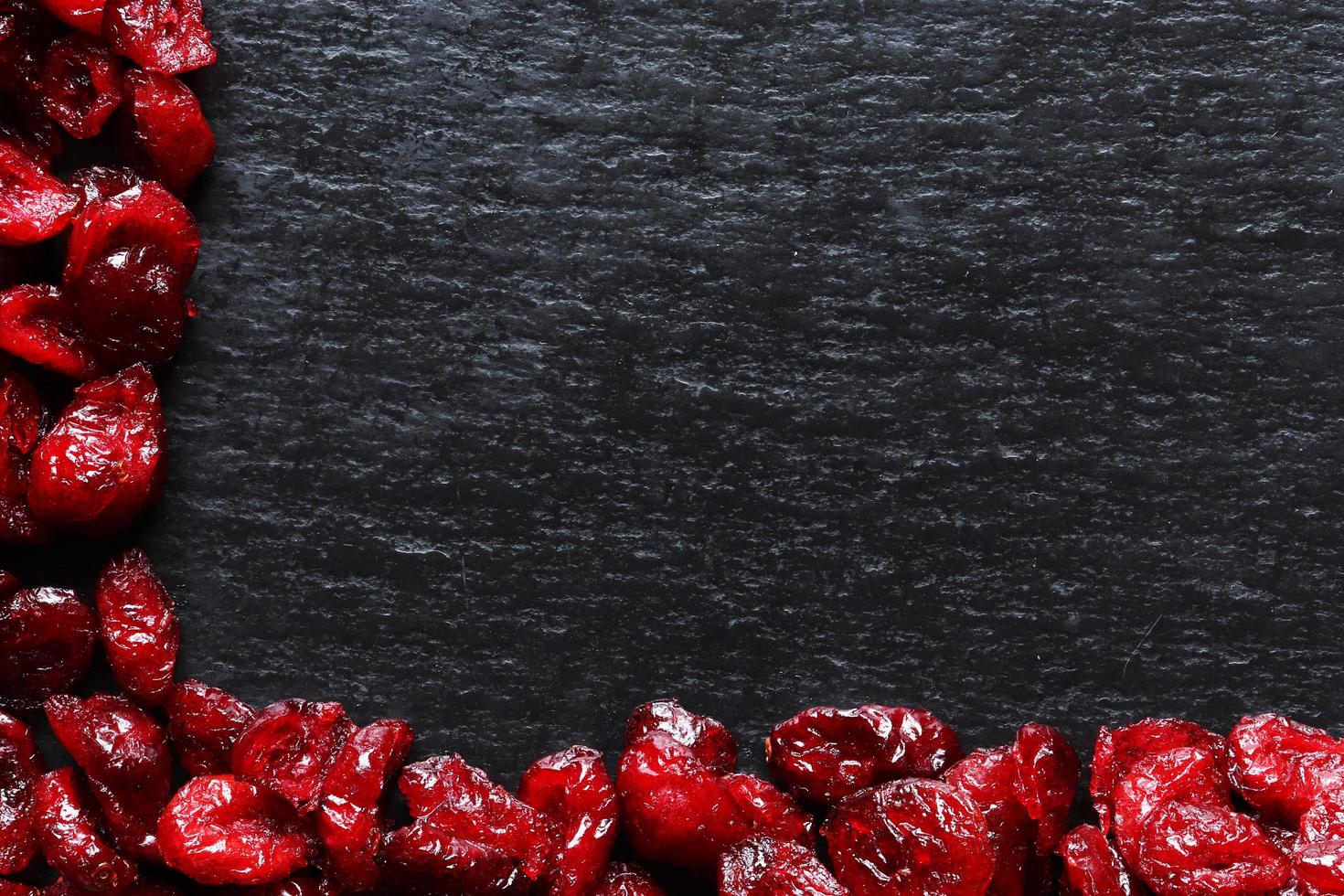 Cranberries on slate background photo