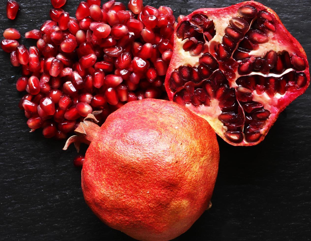 Macro photography of organic pomegranates photo