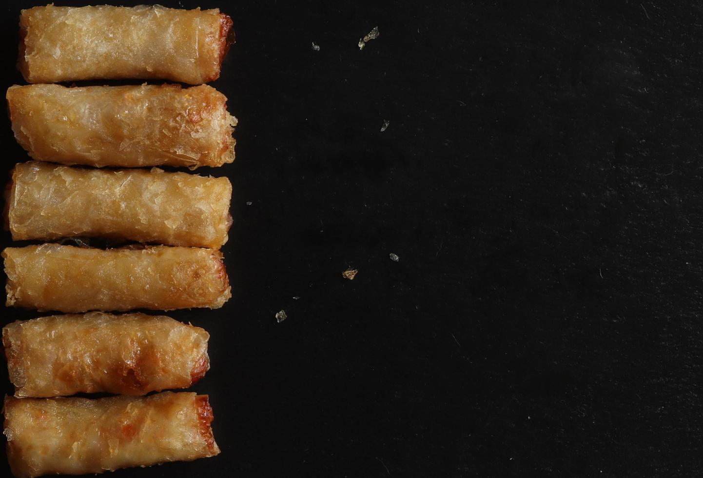 Spring rolls and crumbs photo