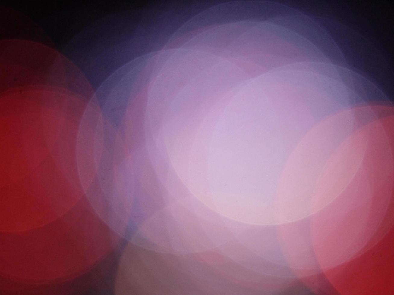 Calm bokeh circles in lavender and red photo