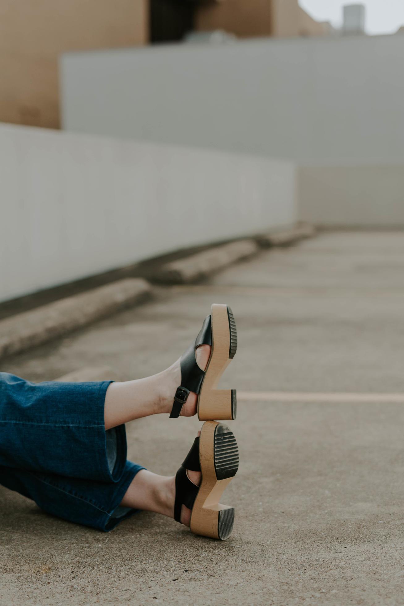 Person #39 s outstretched feet in a parking lot 1410309 Stock Photo at Vecteezy Person #39 s outstretched feet in a parking lot 1410309 Stock Photo at Vecteezy