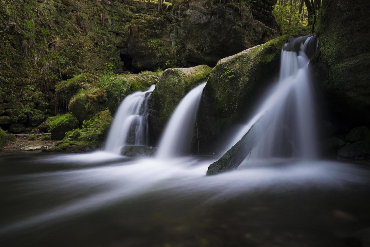 Flowing waterfall in Luxembourg photo