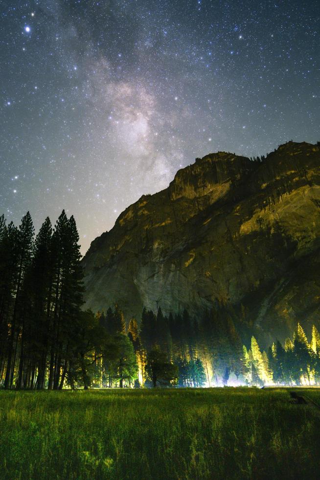 Mountain under the galaxy photo