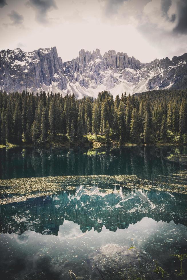 Lake with forest and mountains photo