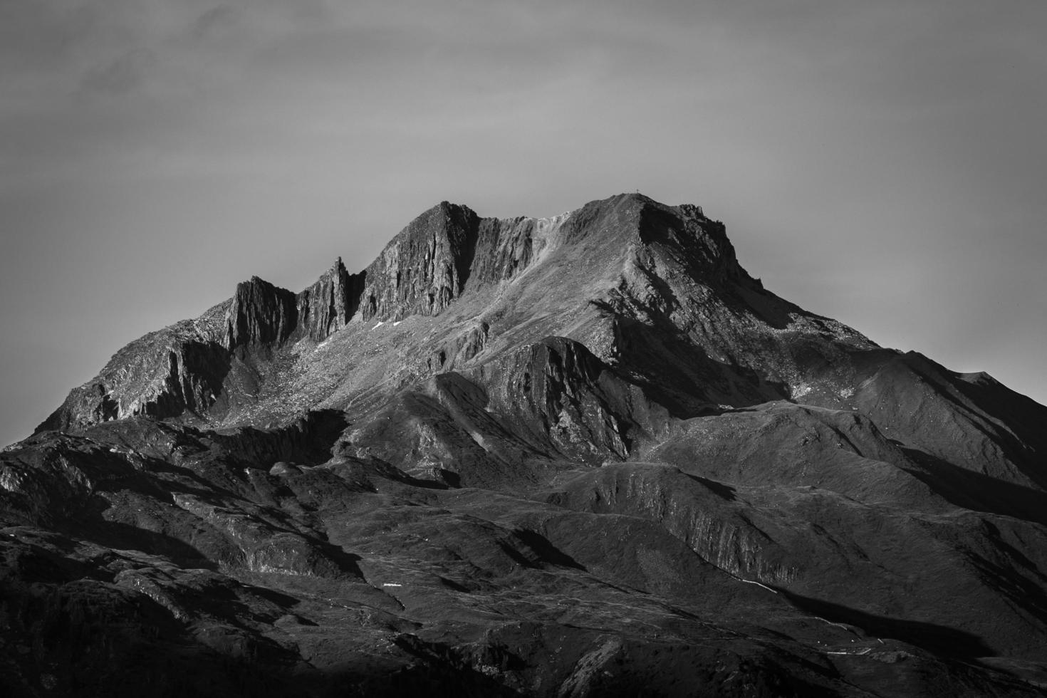 Grayscale of rocky mountains photo