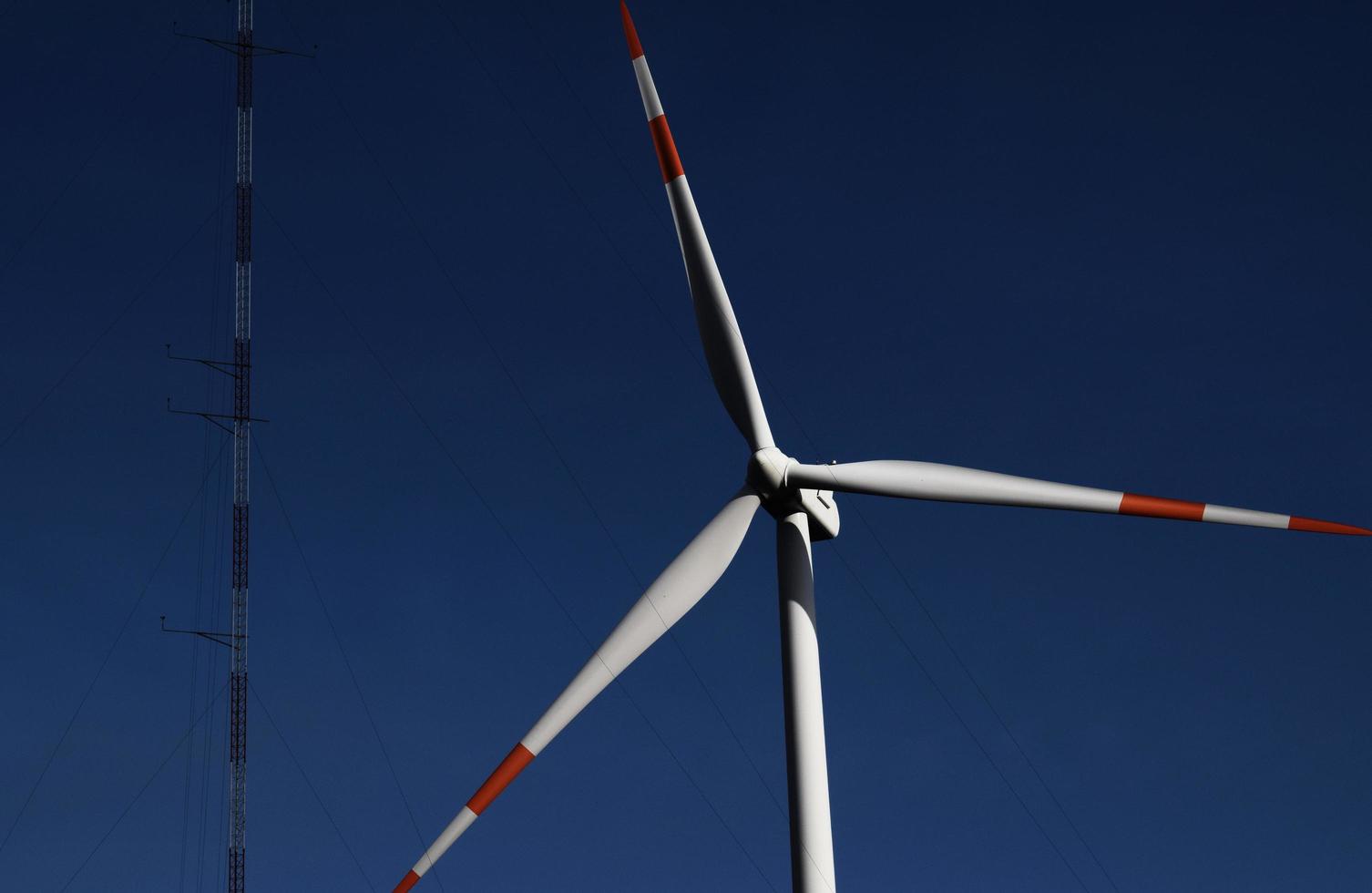 Close-up photography of white and red wind turbine photo