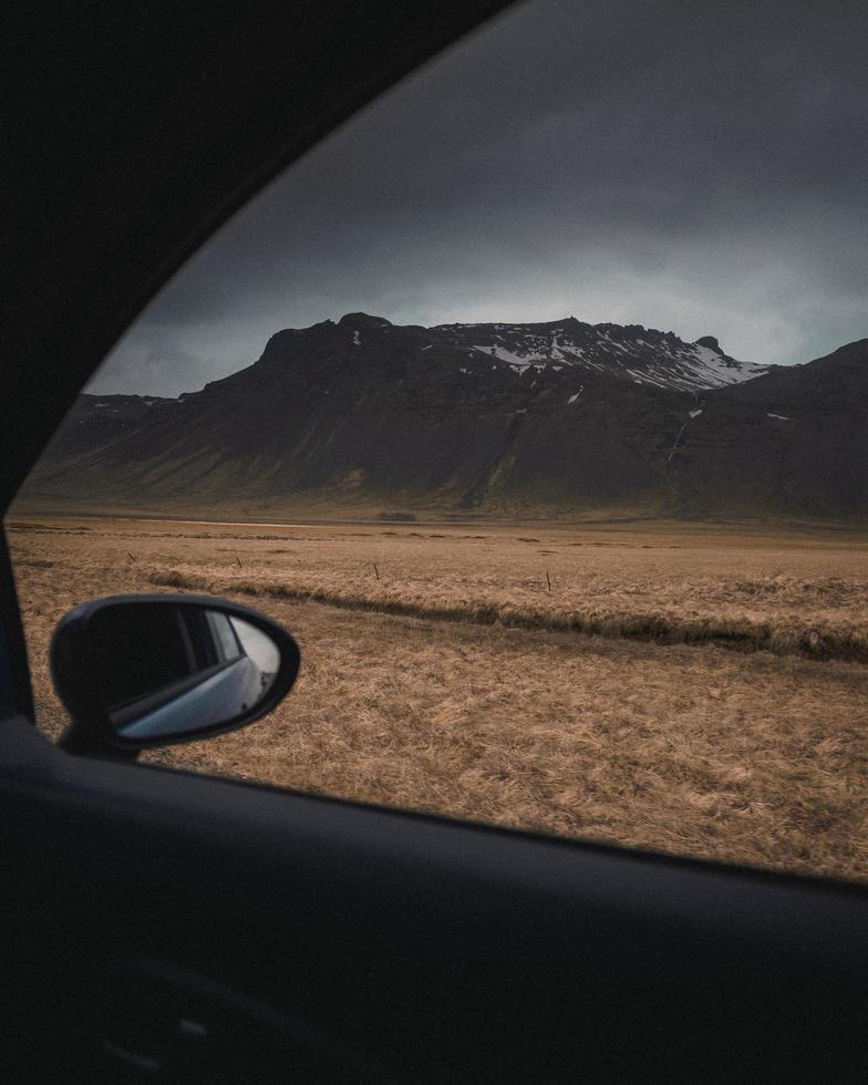 Car ride through a moody landscape photo