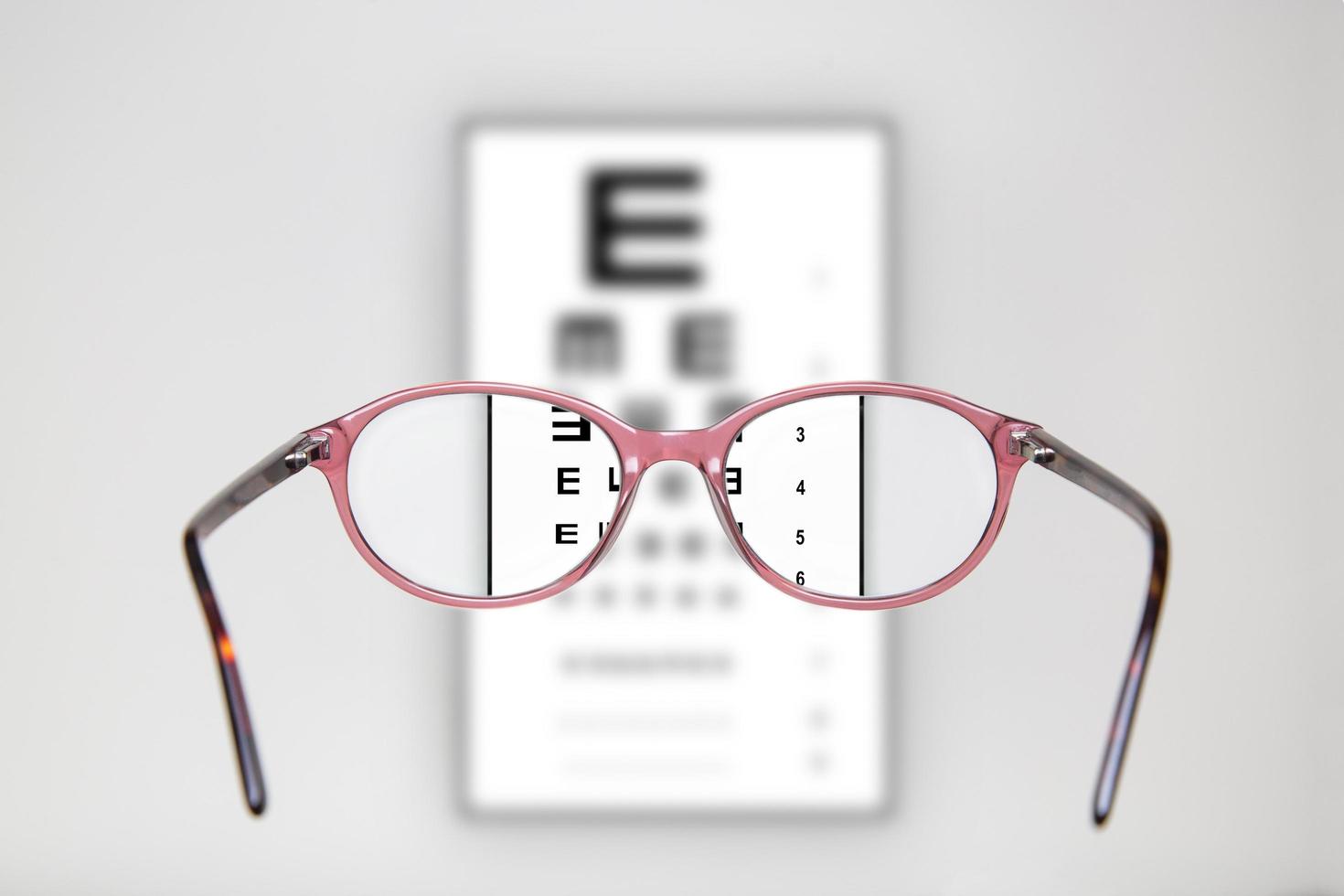 Vision exam through a pair of glasses photo