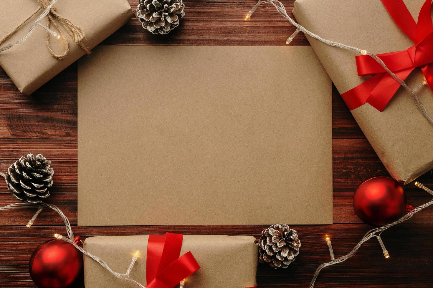 Kraft paper surrounded by Christmas decor photo