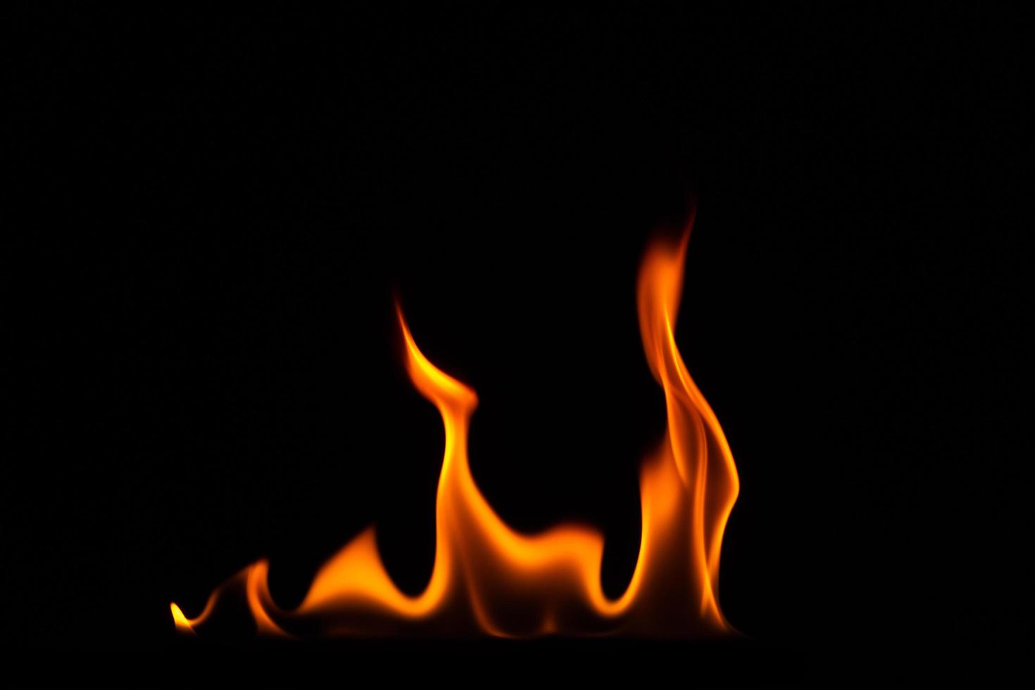 Close-up shot of flame on black background photo