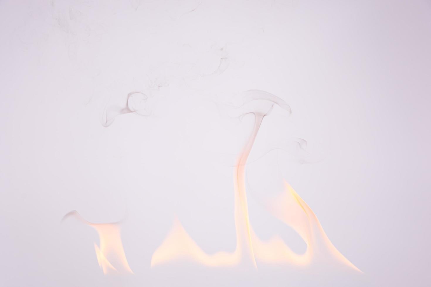 Fire and smoke on white background photo