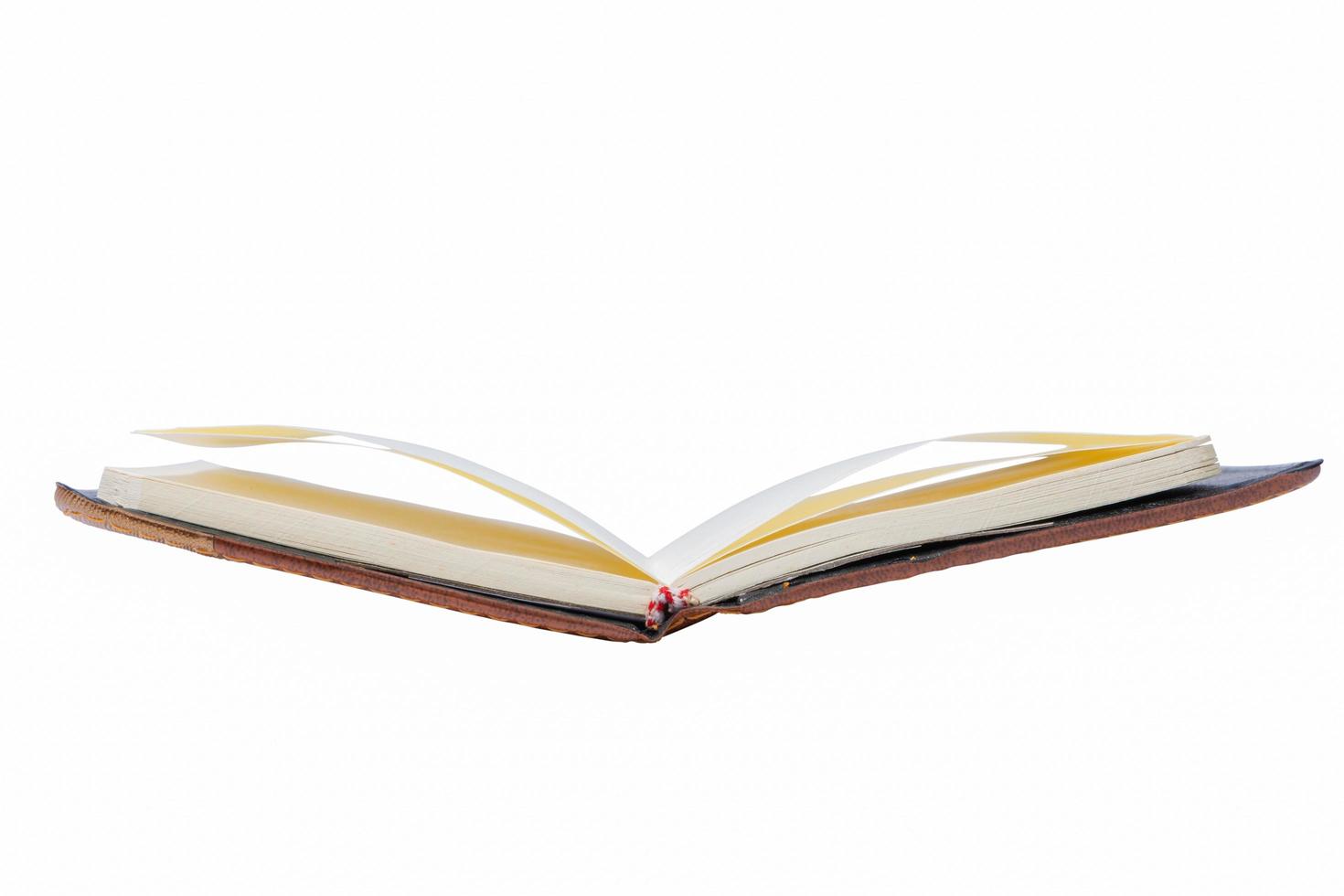 Open book on white background photo