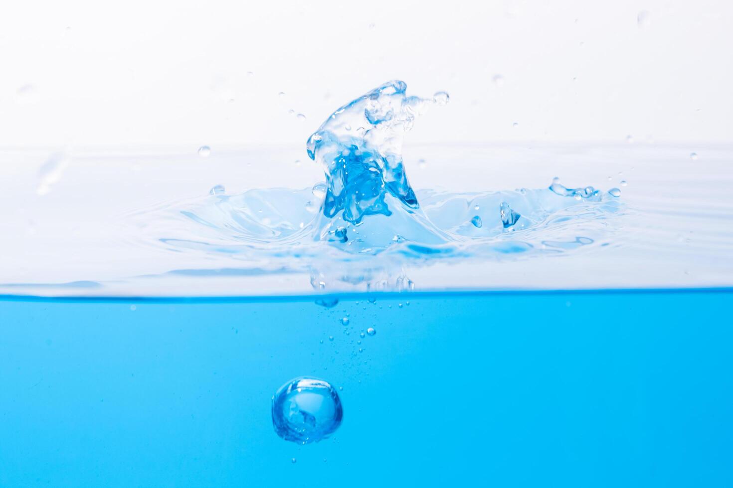 Water droplets on the water surface photo