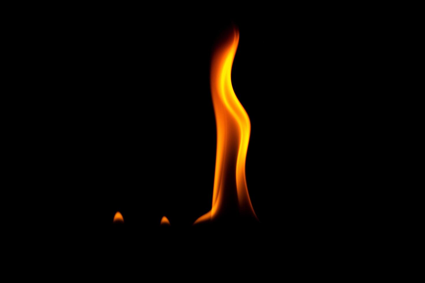 Close-up shot of flame on black background photo