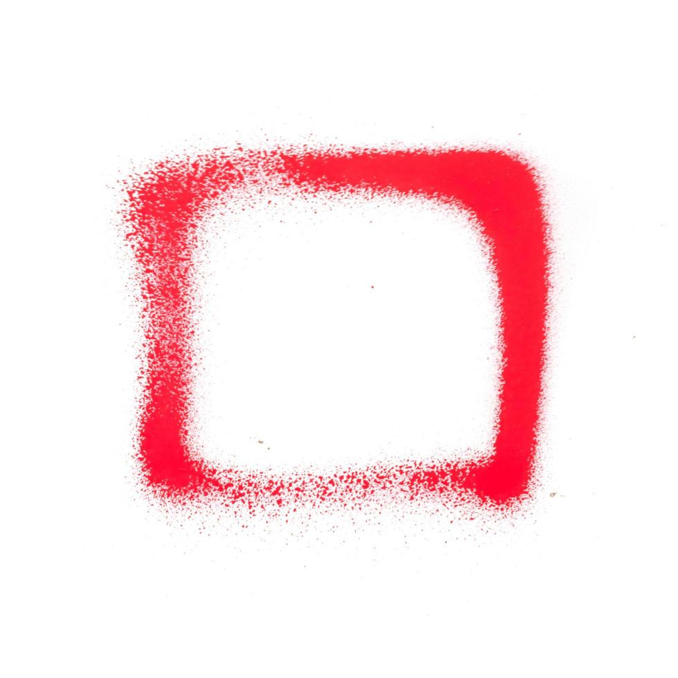 Bright red spray paint texture on white background photo