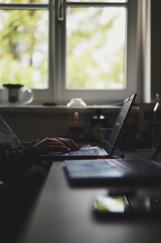 Person working on laptop photo