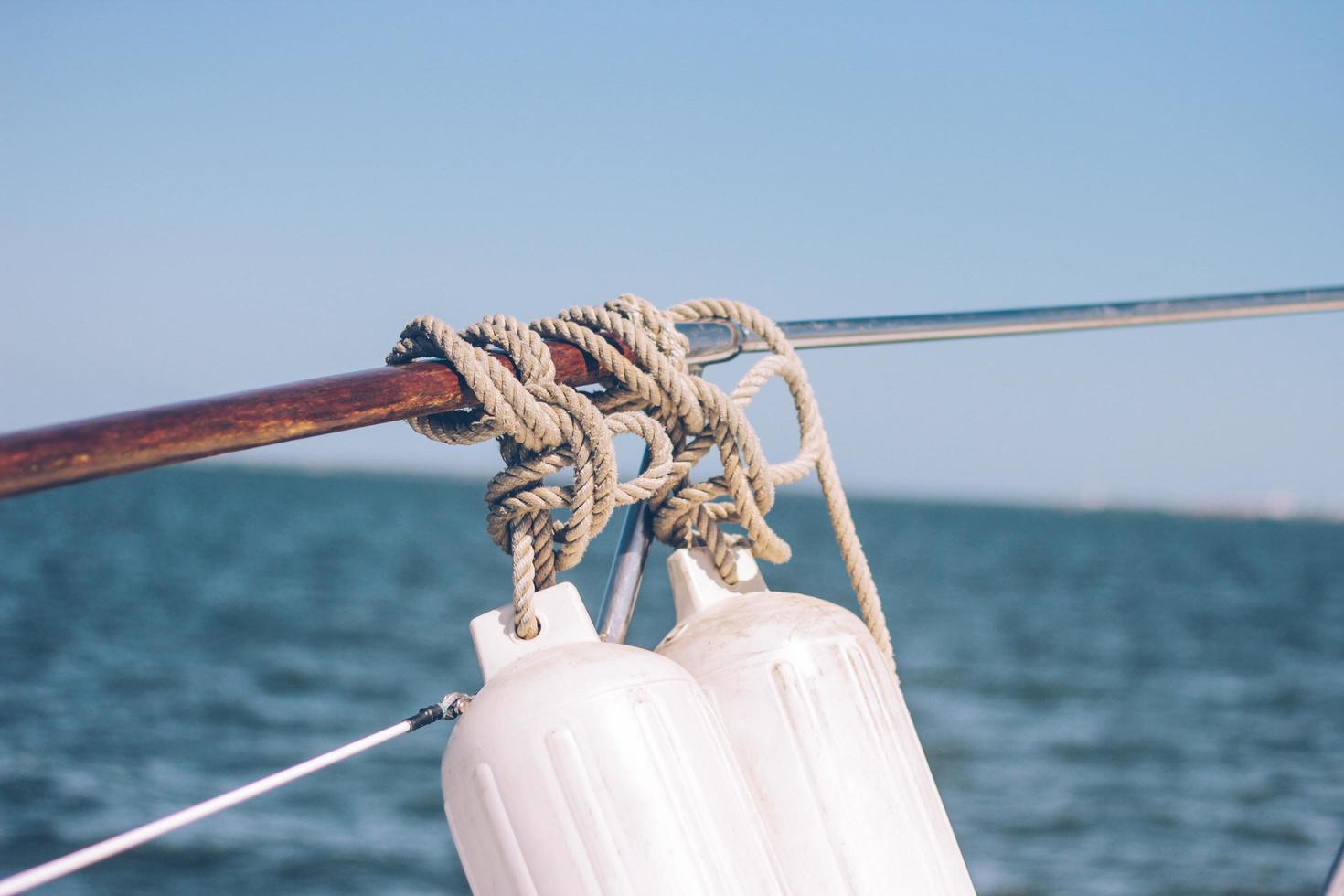 Gray rope tied to a boat photo