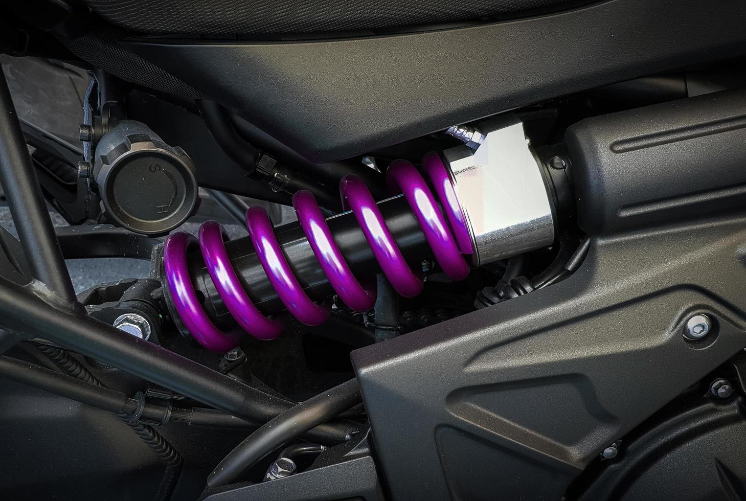 Close-up of motorcycle shock absorbers photo