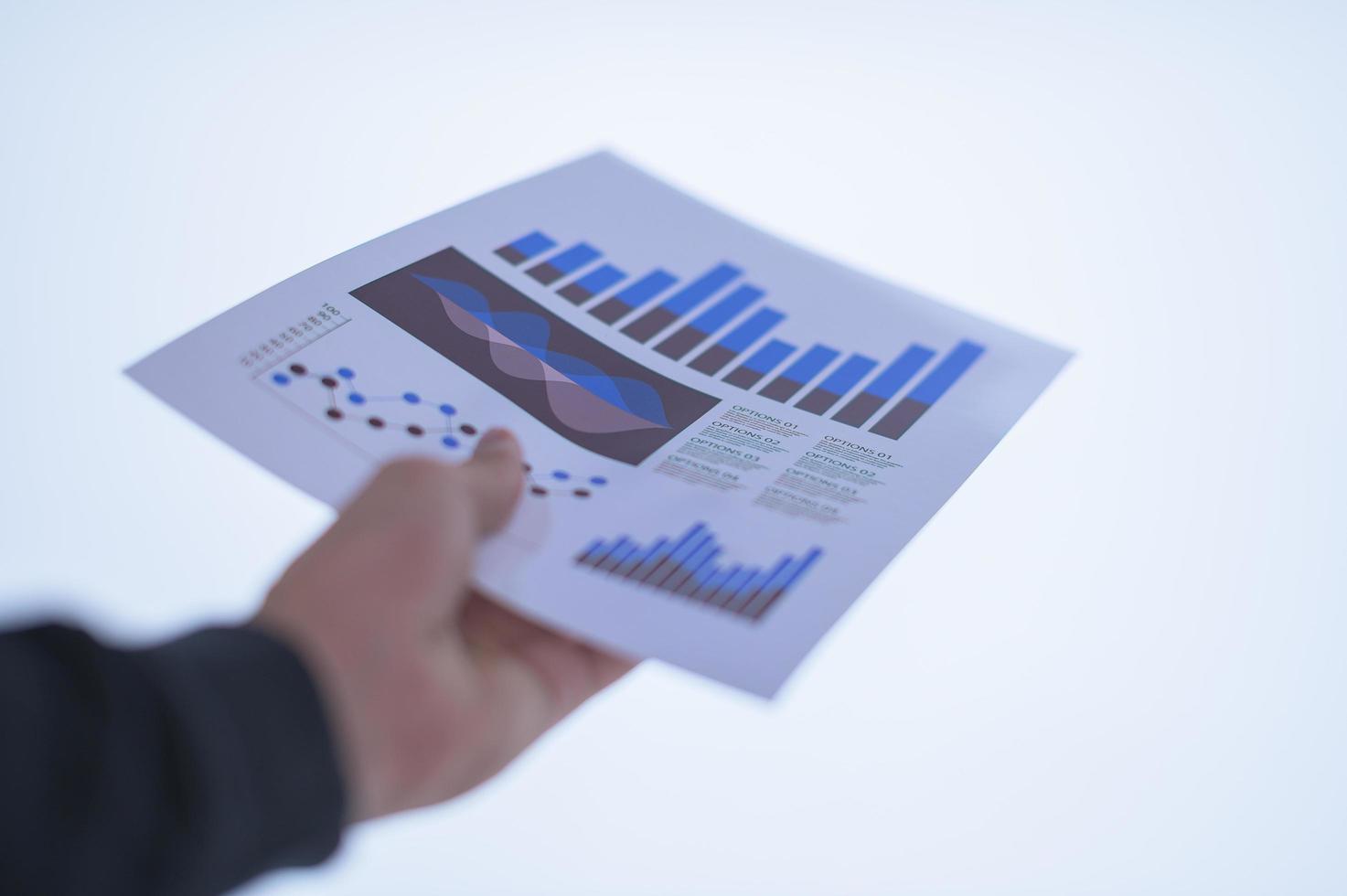 Hand holding a document photo