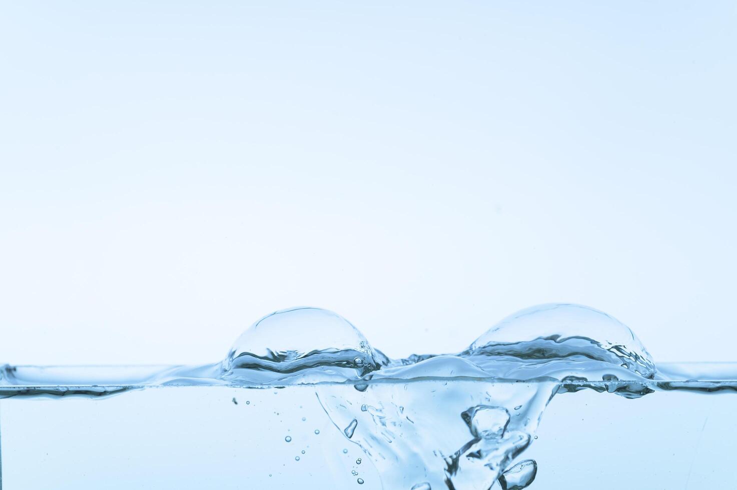 Water surface on white background photo