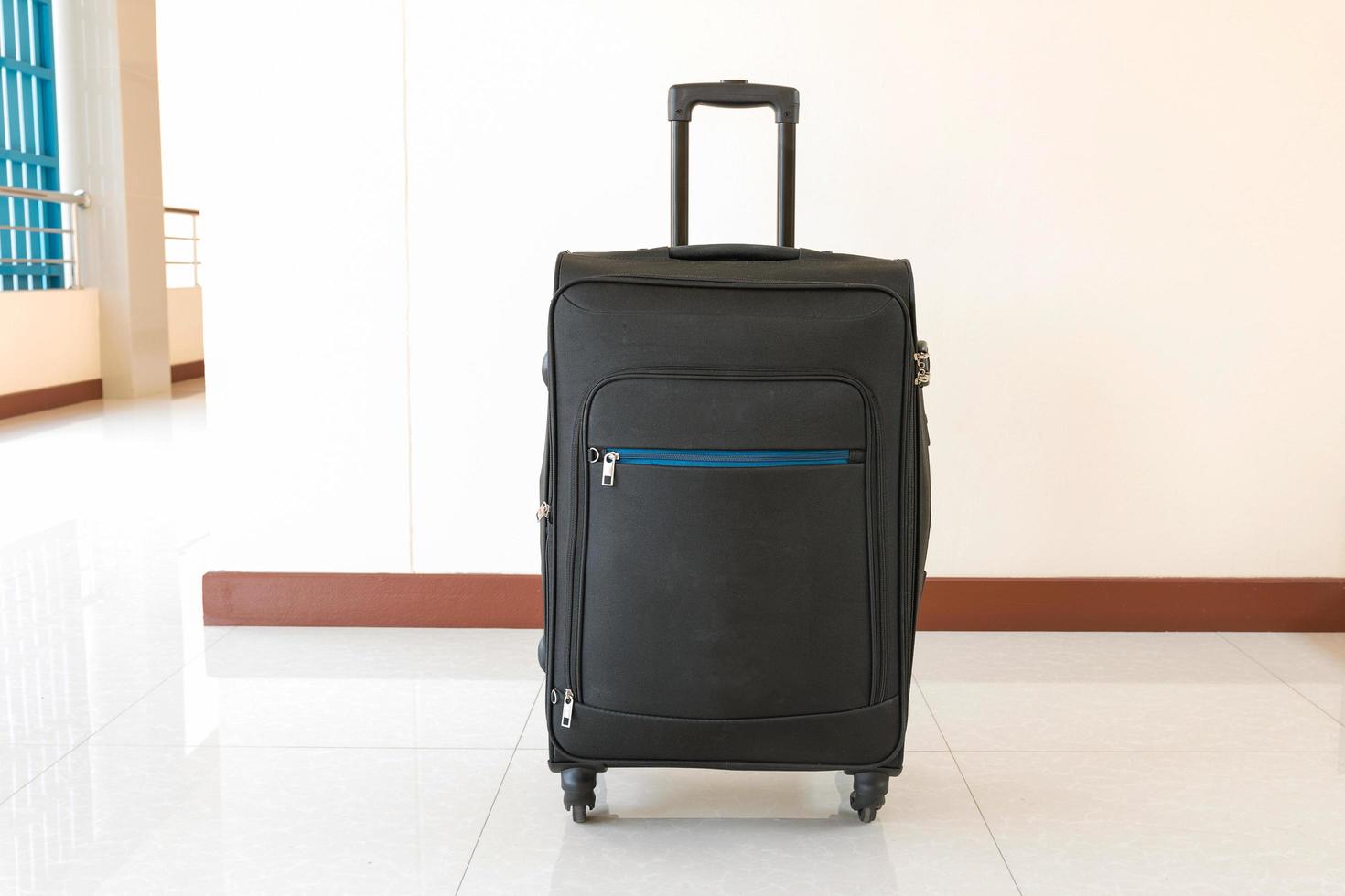 Isolated black suitcase luggage photo