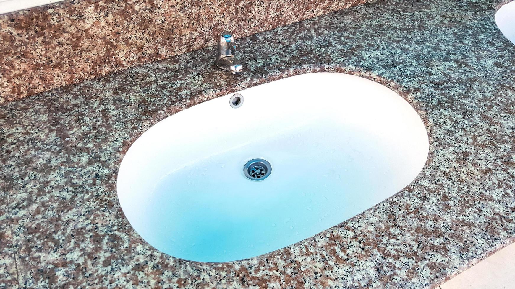 Close-up of bathroom sink photo