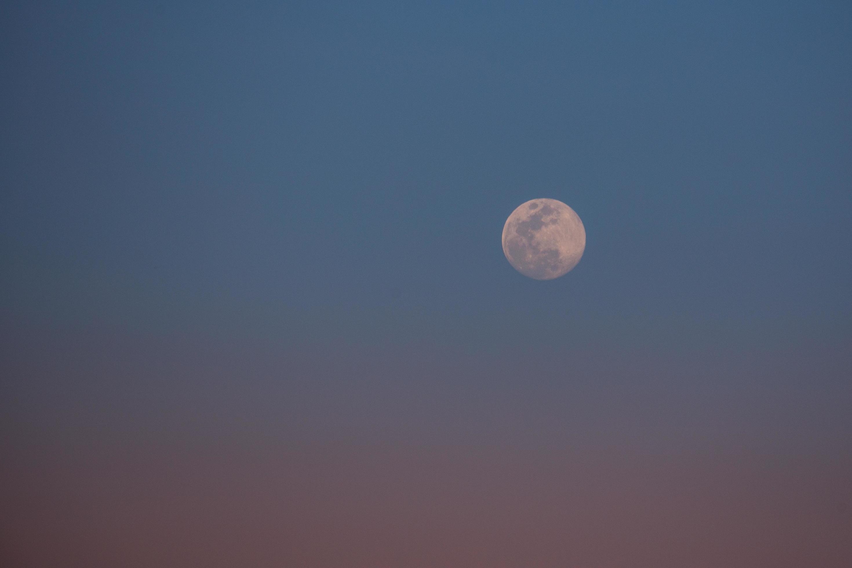 Pastel Sunset With Moon In Sky Stock Photo Pastel Sunset With Moon In Sky Stock Photo
