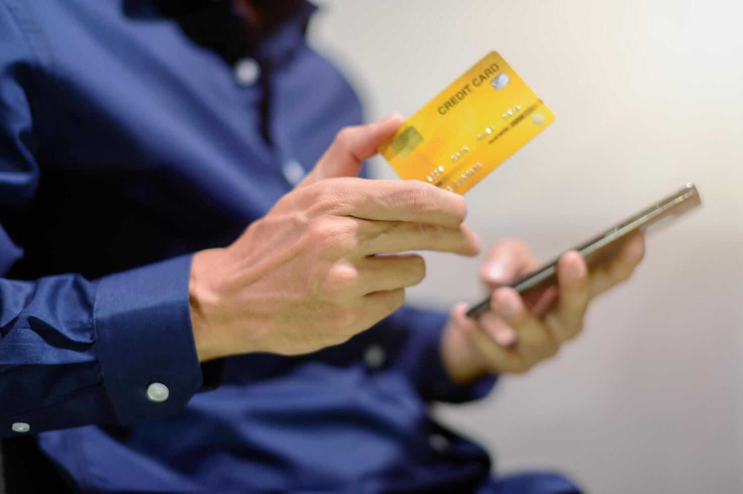 Businessman with credit card photo