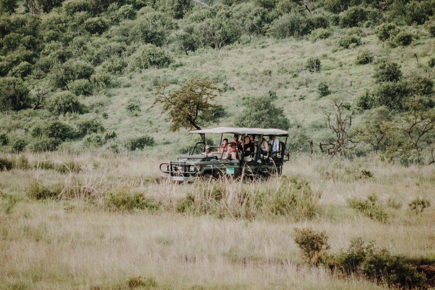 Cape Town, South Africa, 2020 - A group of tourists on a safari photo