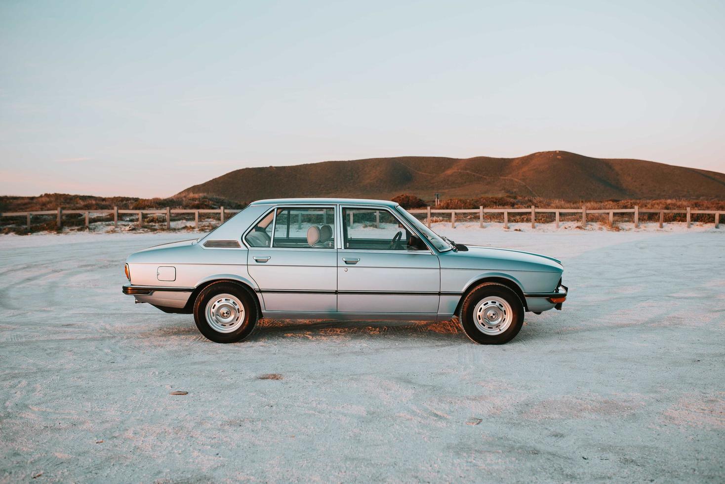 Cape Town, South Africa, 2020 - Grey sedan parked near beach photo