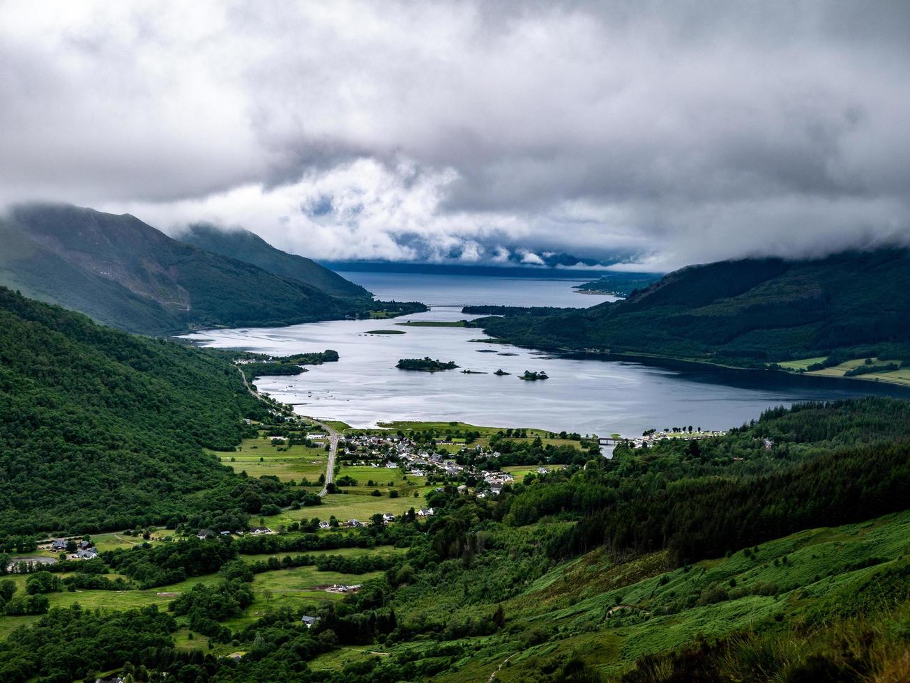 Mountain town near lake photo