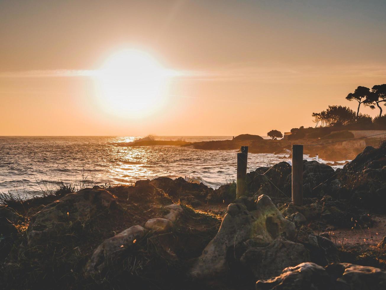 Sunset on a beach in Antibes photo