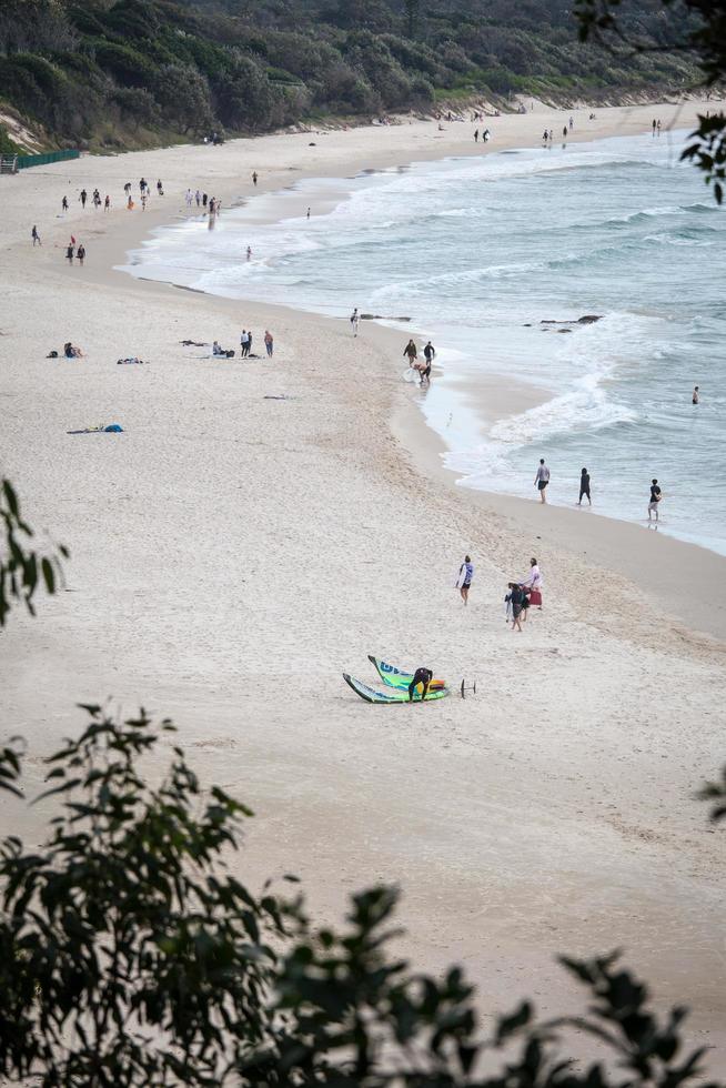 Byron Beach, Australia, 2020 - People on a beach during the day photo