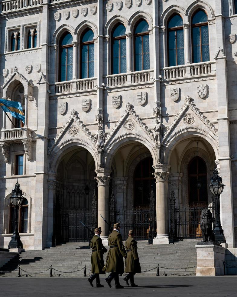 Budapest, Hungary, 2020 - Soldiers in front of the Hungarian Parliament photo