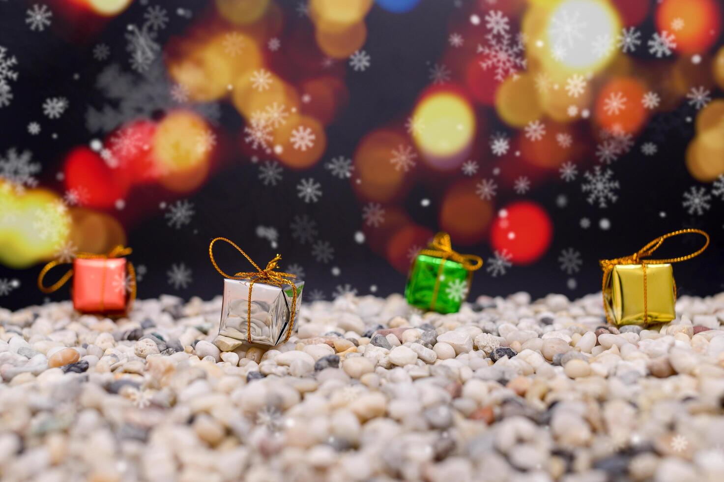 Merry Christmas background with miniature gift boxes photo