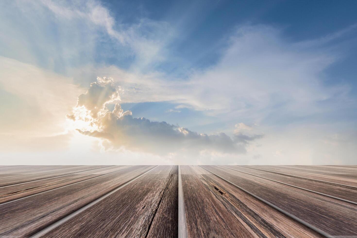 Wooden floor with sky background photo