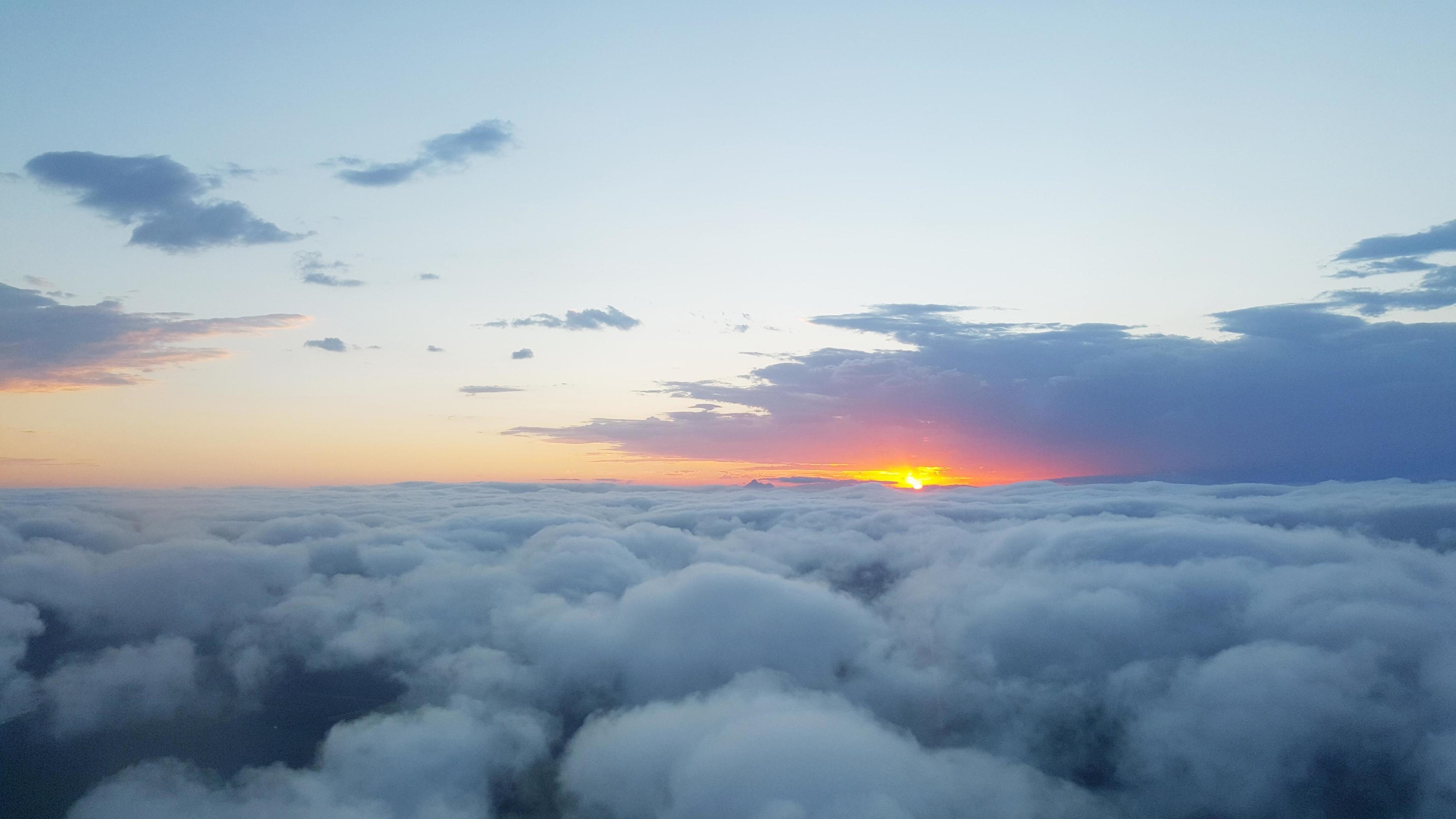 Aerial view of clouds at sunset 1435471 Stock Photo at Vecteezy