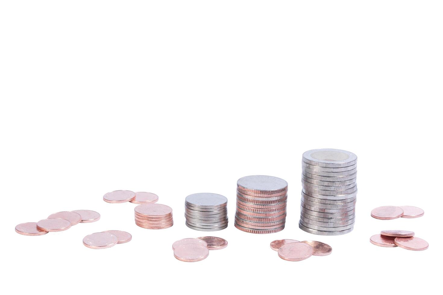 Stacked coins isolated on white background photo