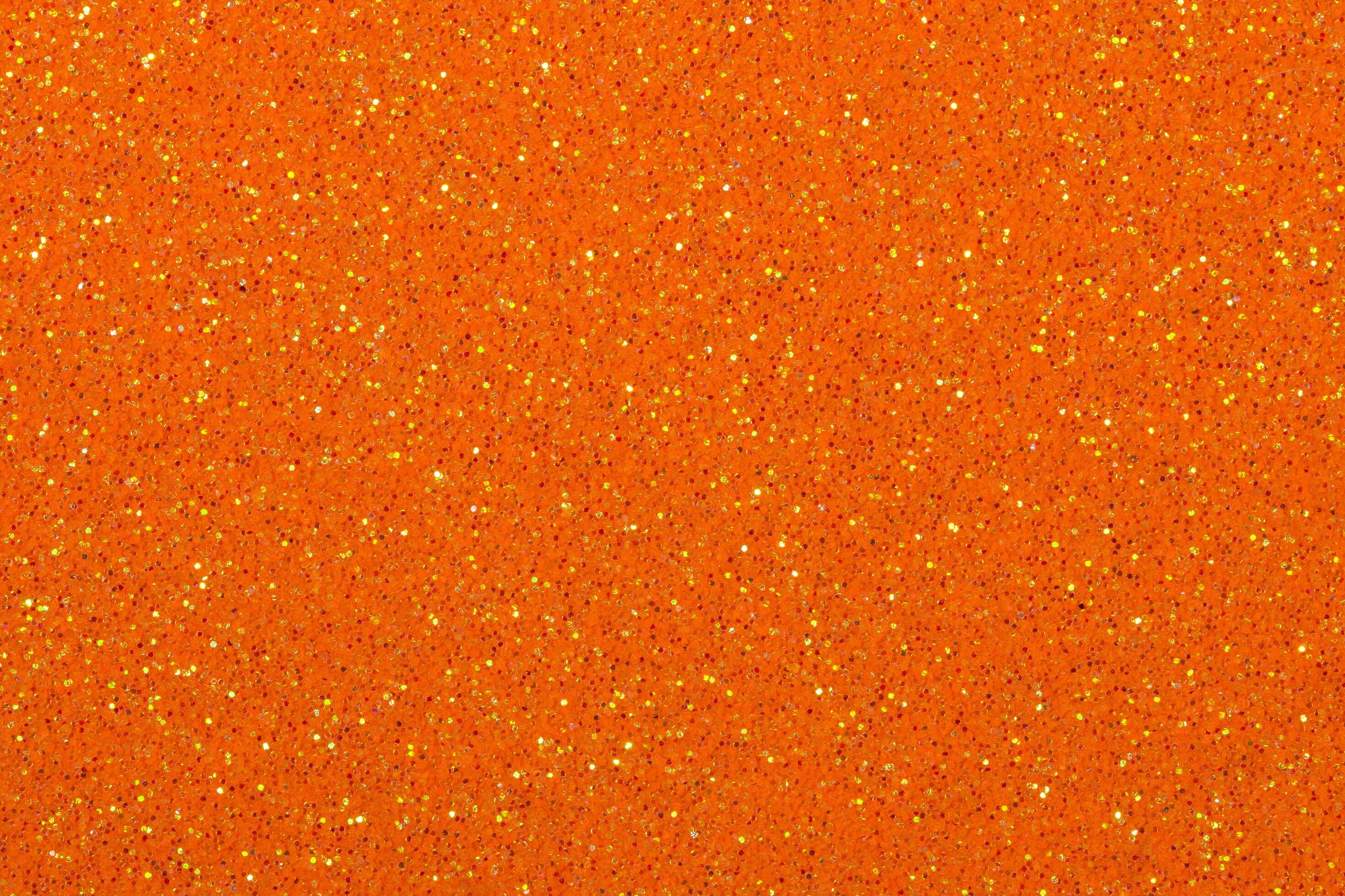 Orange glitter background 1446226 Stock Photo at Vecteezy