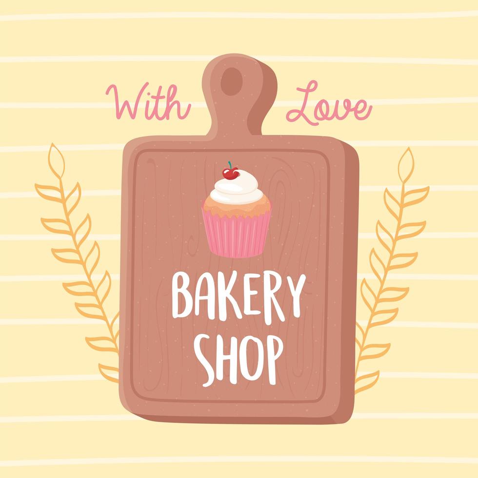 Bakery shop cupcake and cutting board emblem vector