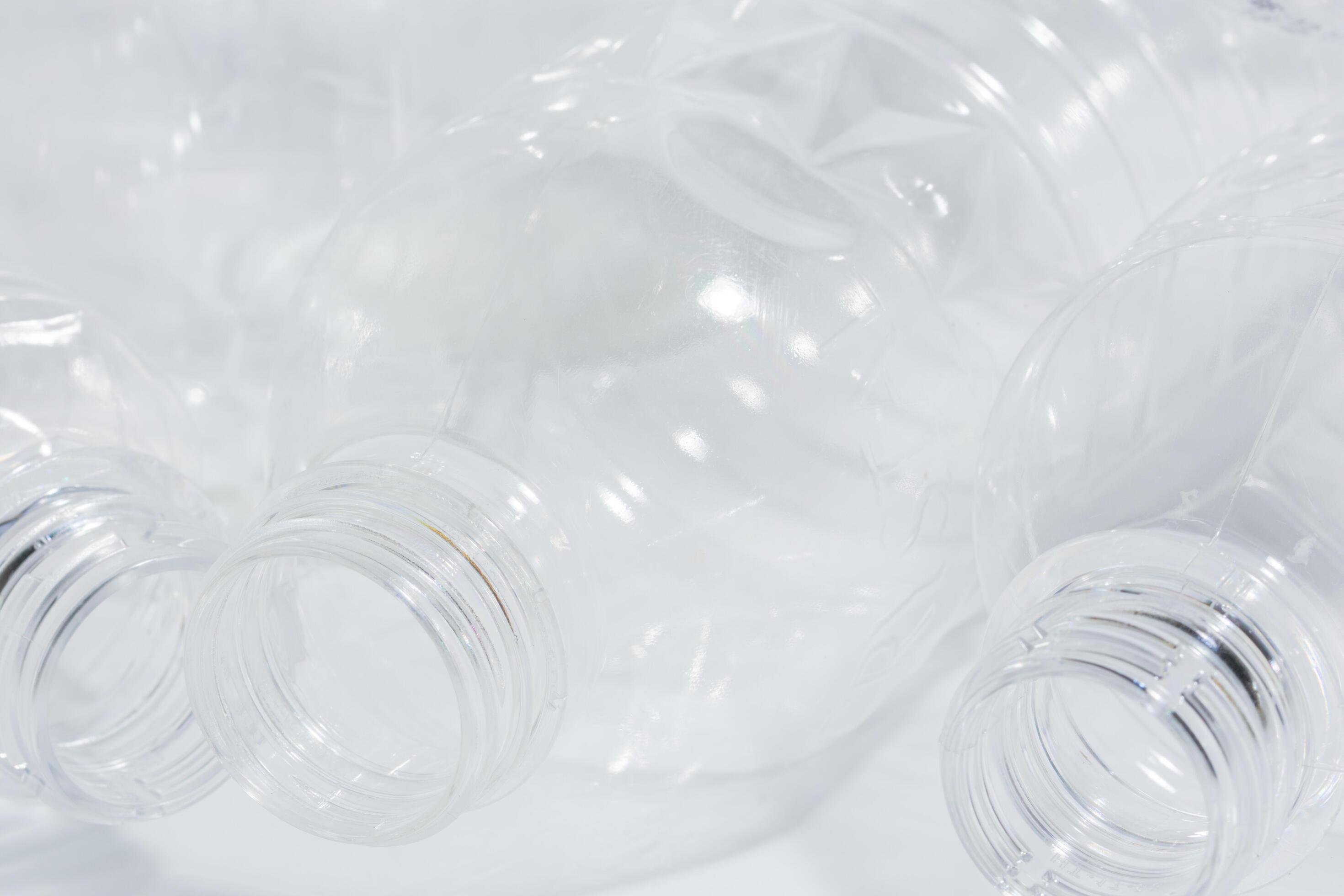 Empty plastic bottles on white background 1484542 Stock Photo at Vecteezy