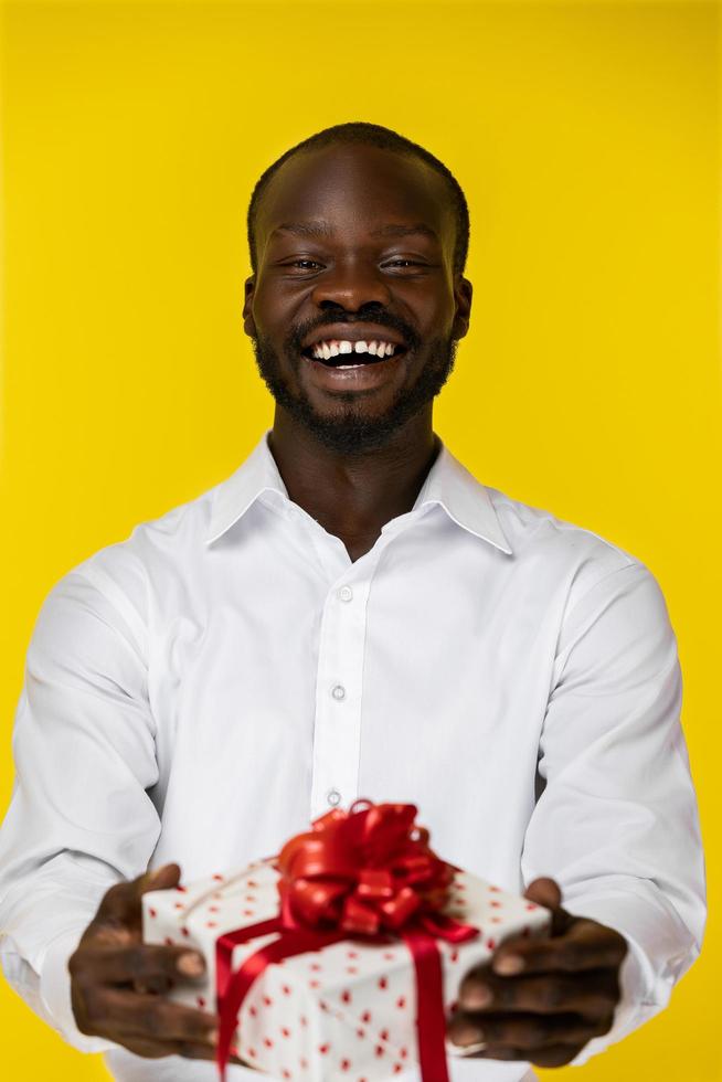 Laughing man with a present photo