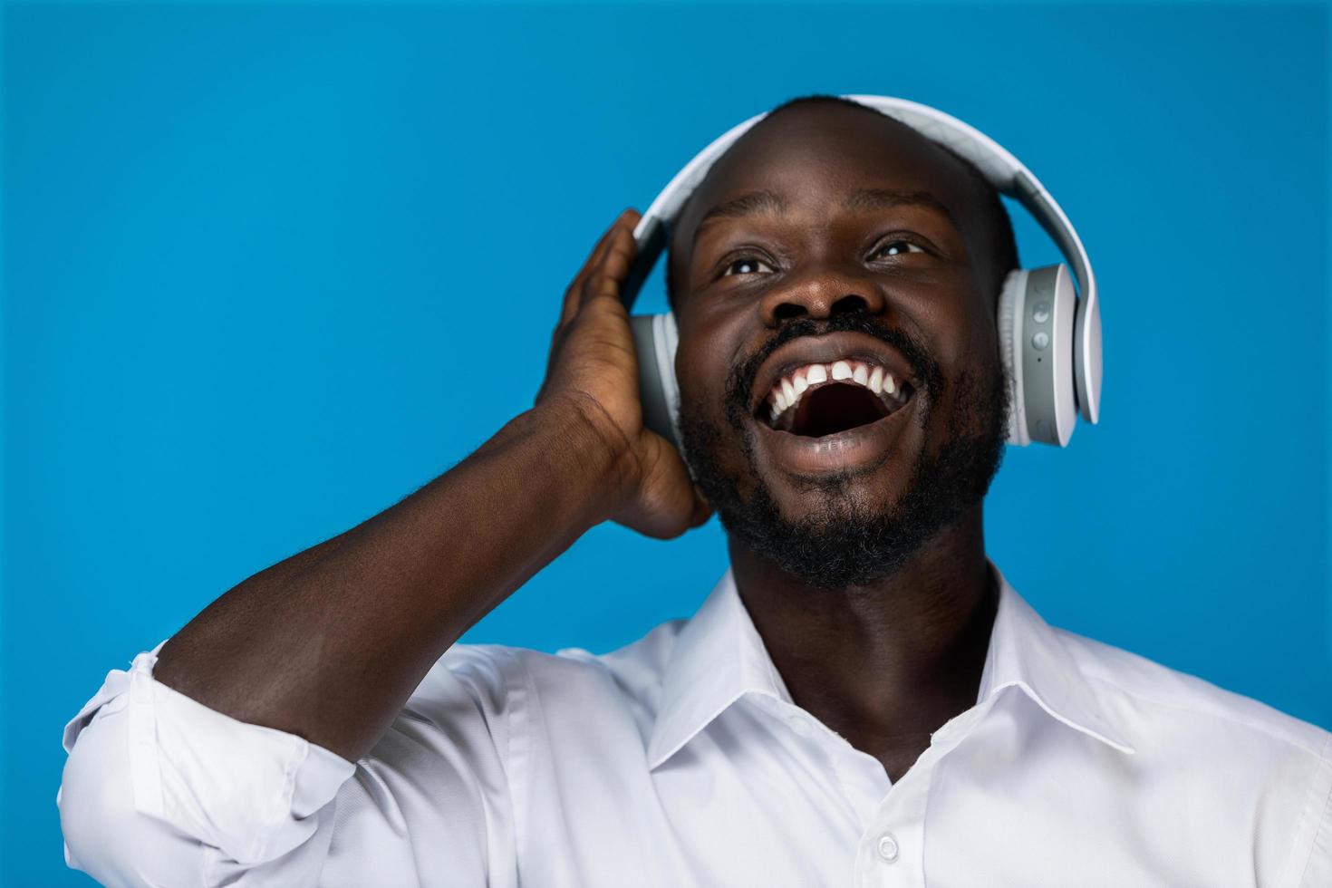 Black man listening to music photo