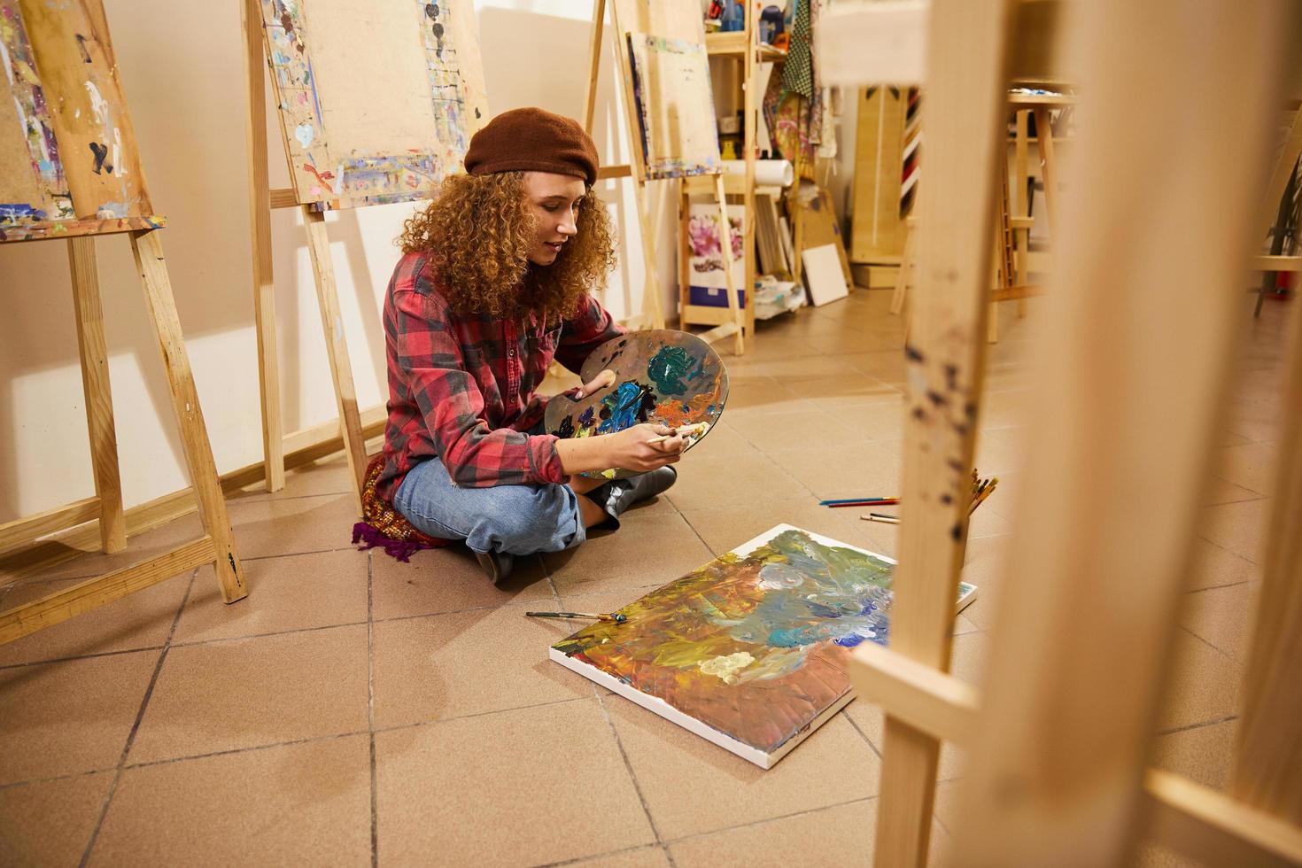 Artist painting in the studio photo