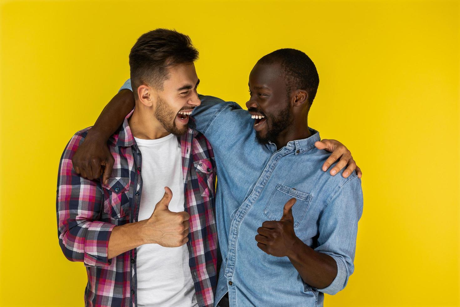 Two friends thumbs up photo