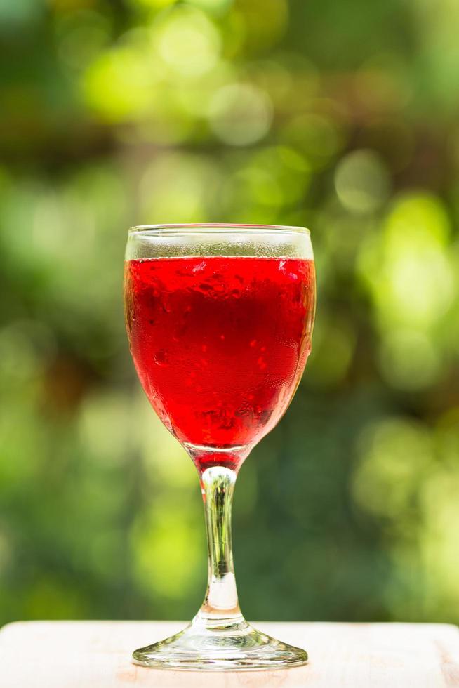 Glass of red juice photo