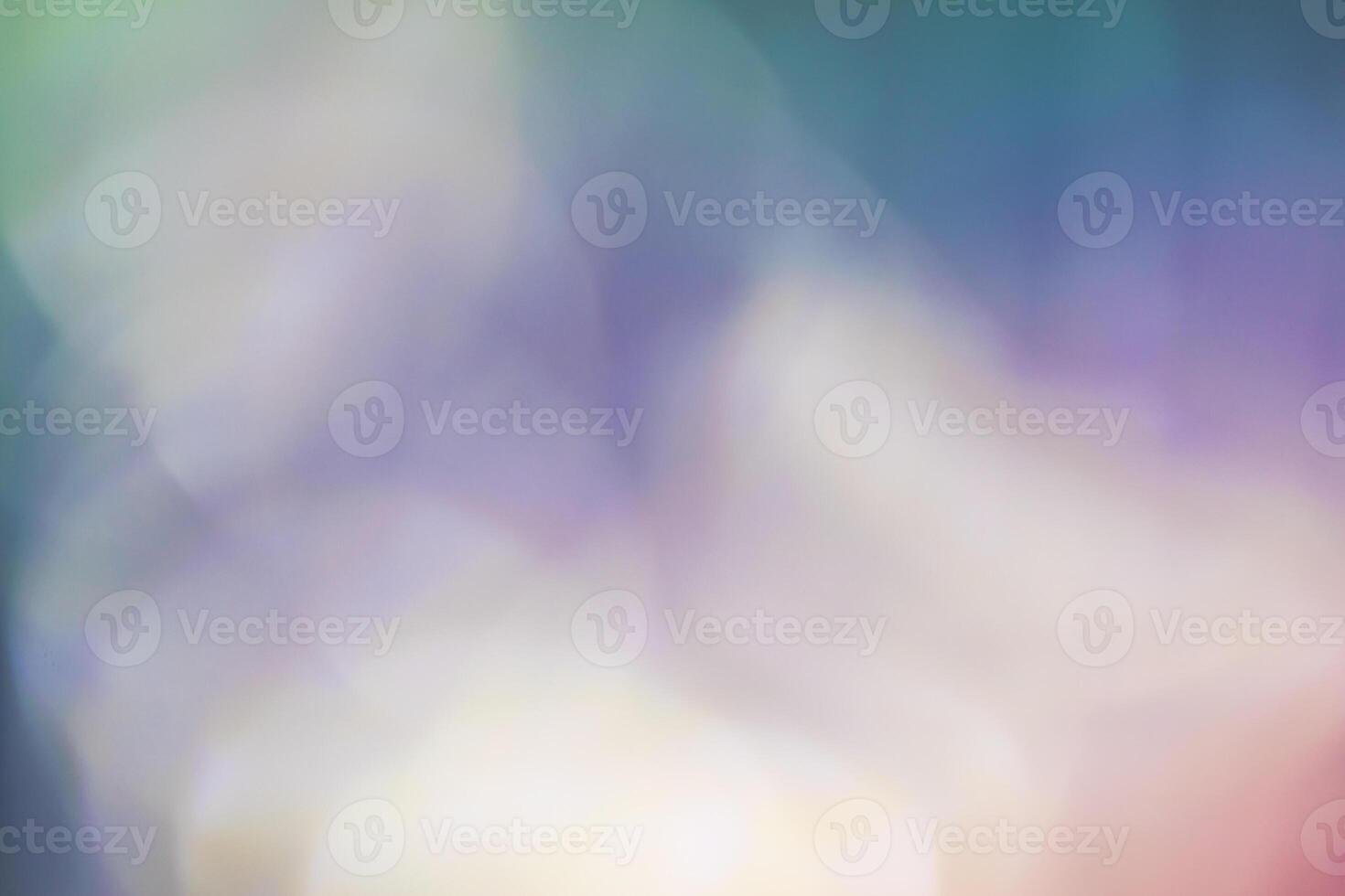 A blurry image of a rainbow colored background photo