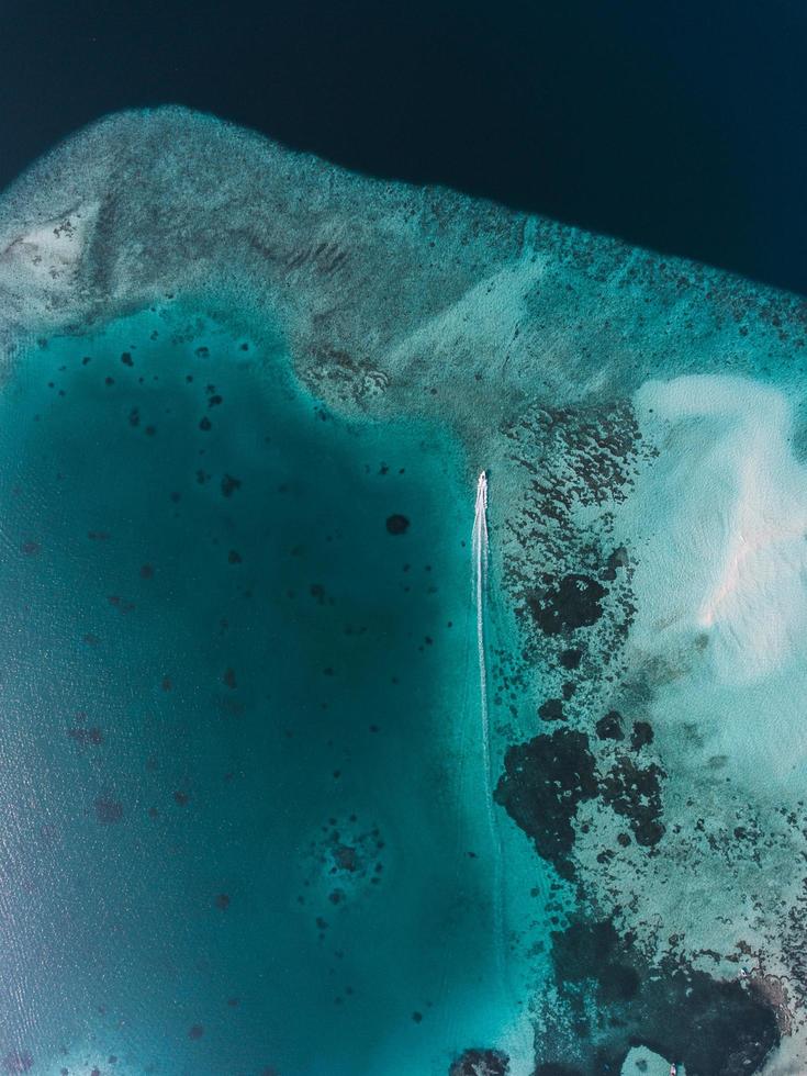 Aerial view of a boat in the Maldives photo