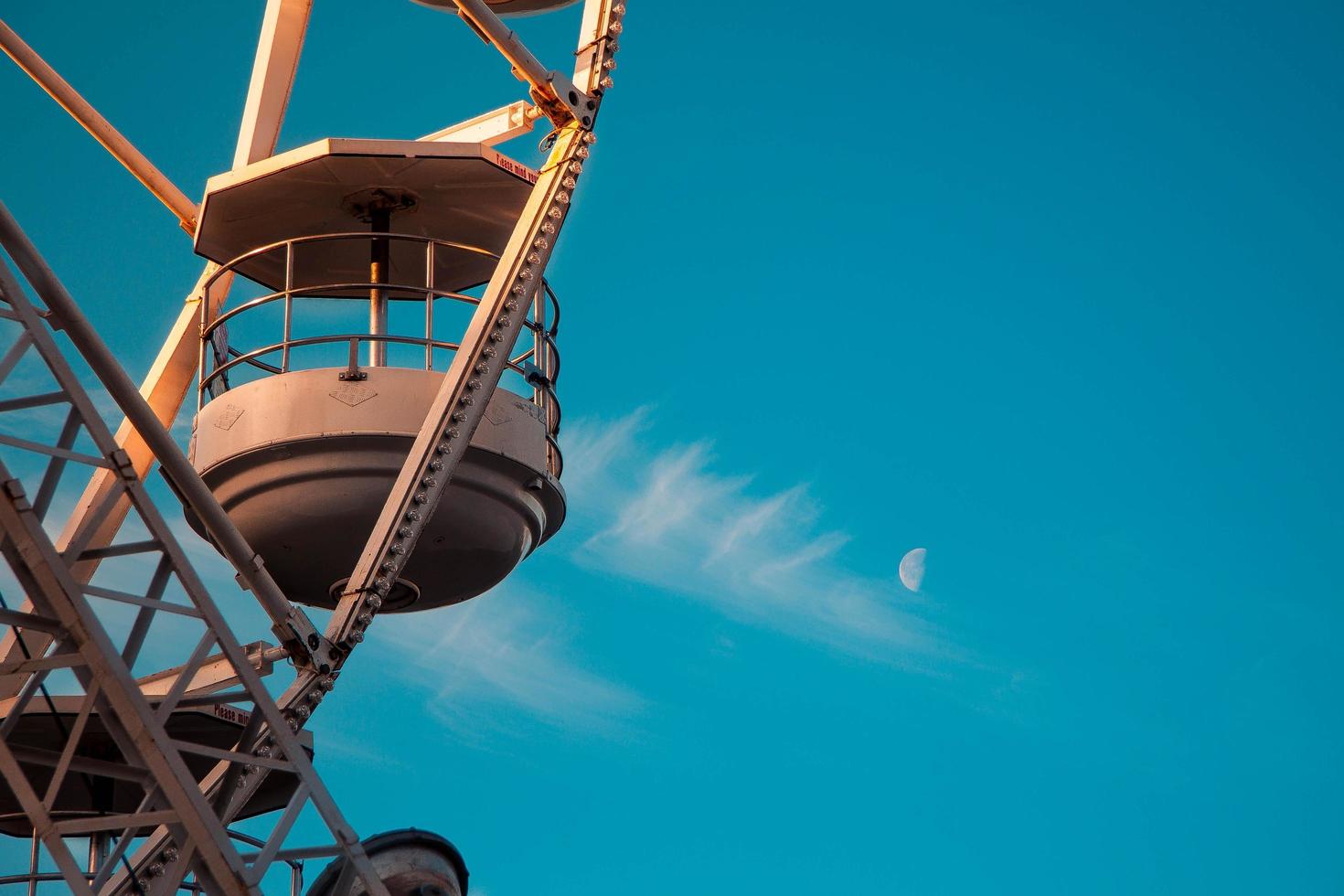 Ferris wheel against a blue sky photo